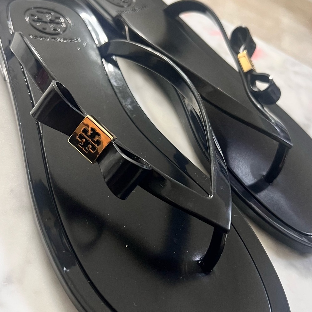 Tory Burch Black Jelly Bow Flip Flop Sandals with Gold Logo Accent